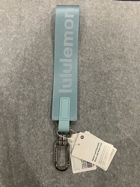 Brand new lululemon athletica Light Blue Key/ Card Holder Wristlet Strap
